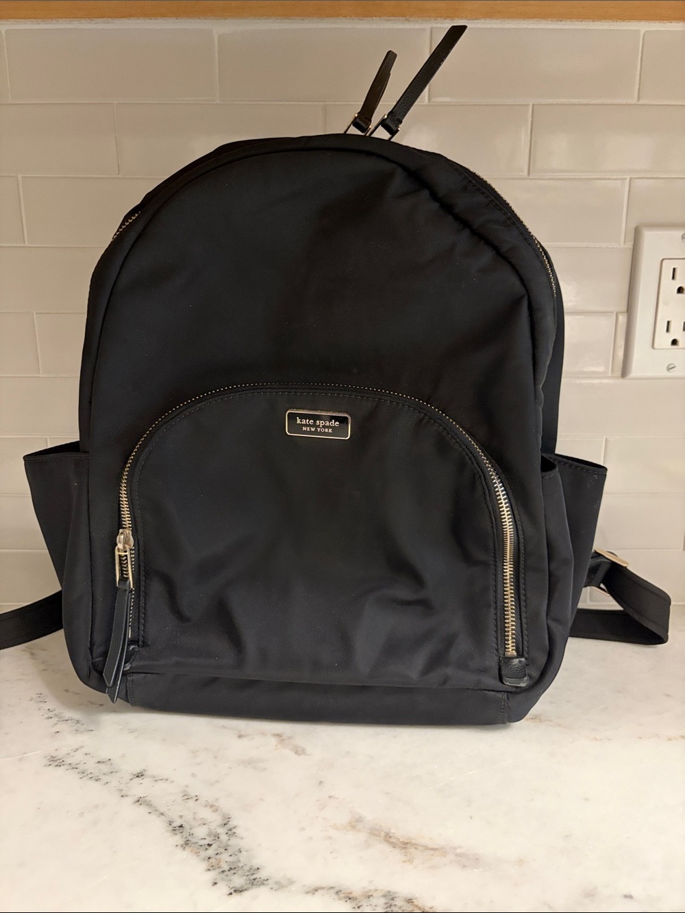 kate spade Black Nylon Backpack with Gold Hardware and padded laptop sleeve